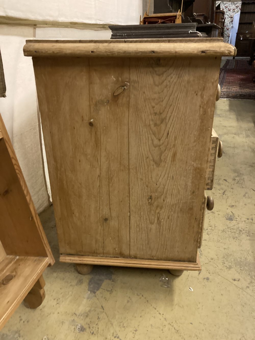 A Victorian pine dresser base, together with a panelled pine plate rack, base width 107cm, depth 50cm, height 80cm